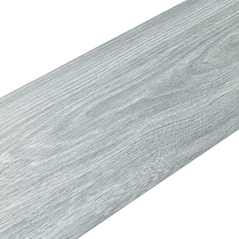 Gray wood-effect PVC flooring tile plank surface with fine realistic wood-grain
