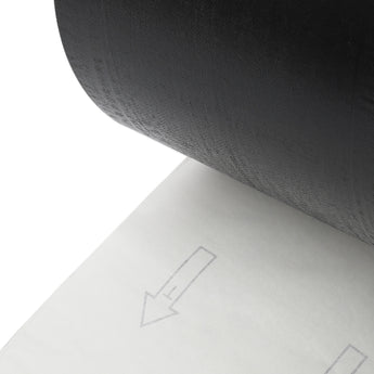 Peel-back backing layer shown on gray wood-effect PVC self-adhesive flooring tile