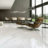 Cool white stone-effect square floor tiles under modern furniture