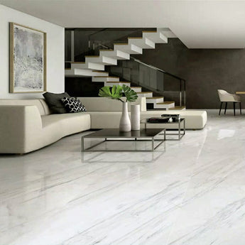 Cool white square stone-effect floor tiles with light gray marble streaks
