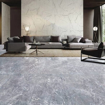 Dark grey stone-effect square floor tiles with pale crackle marble lines