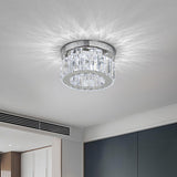 Round crystal LED flush ceiling light with clear prisms and chrome housing