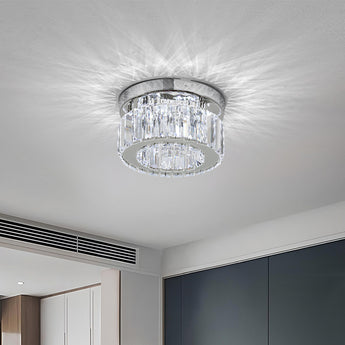 Round crystal LED flush ceiling light with clear prisms and chrome housing