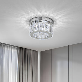Modern round crystal LED ceiling light; chrome ring with clear prism glass shade
