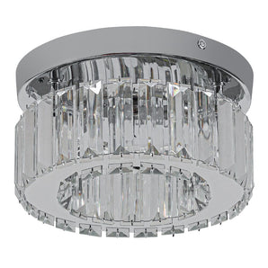 Round crystal LED ceiling light close-up with faceted clear glass prism panels