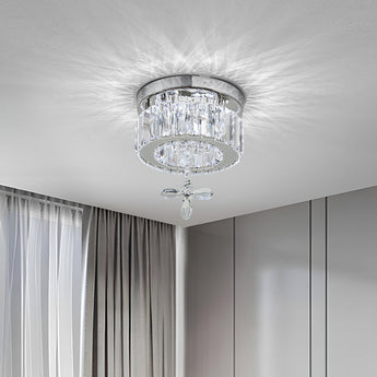 Modern round crystal LED ceiling light with clear crystal drop pendant in the center