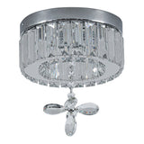 Close-up: round crystal LED ceiling light with clear prisms and central hanging crystal pendant