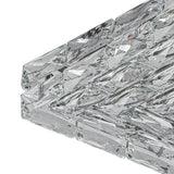 Close-up of crystal facets on a square LED ceiling light cover, clear and reflective