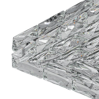 Close-up of crystal facets on a square LED ceiling light cover, clear and reflective