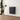 Matte black aluminium panel electric wall heater mounted on a wall.