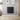 Matte black aluminium panel electric wall heater, rectangular ribbed front.
