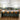 Black 3-light pendant light with wave-textured clear glass shades and black stems