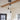 Black 3-light pendant light with clear wave glass shades and round black ceiling canopy