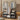 Garment rack with hanging clothes, lower cubby bins, and gray fabric shelves