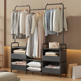 Garment rack with hanging clothes, lower cubby bins, and gray fabric shelves
