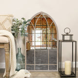 Arched metal garden wall mirror with window-style grid, full front view