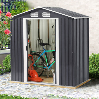 Black steel shed with wide open double doors showing interior storage area