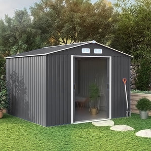 Black steel storage shed with open front door and gabled roof vents