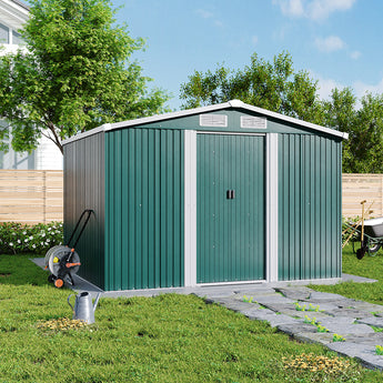 Green metal garden tools shed with gabled roof and double doors, ventilation vents on top
