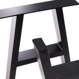 Close-up of black metal table leg end cap and steel support bar