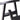 Close-up of black metal table leg end cap and steel support bar