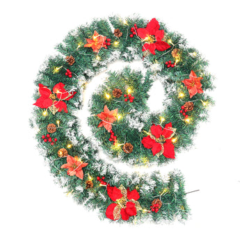 Artificial LED Christmas wreath garland with red and orange poinsettias and warm white lights