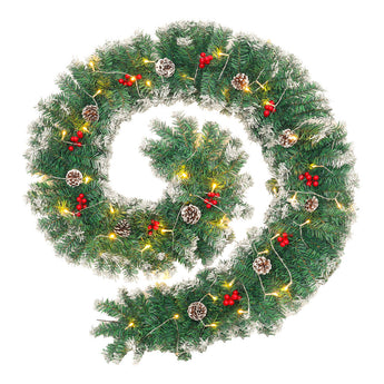 Artificial LED Christmas wreath garland with pine cones, red berries, and warm white lights