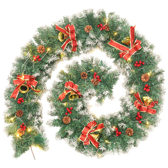 Christmas LED garland wreath with green foliage, red ribbons, pine cones, and warm lights