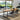 Black metal table legs beneath a wooden tabletop, open rectangular frame bases.