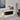 White electric fireplace with flame effect and small red status light on frame
