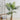 110cm artificial potted palm tree with fan-like green fronds in a woven top planter