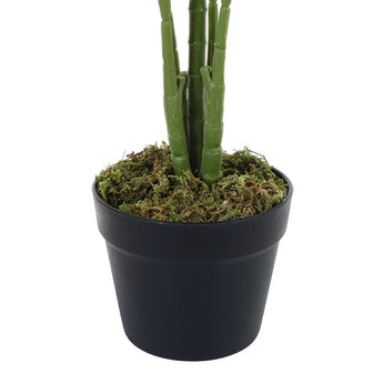 Artificial palm tree base with green stems in a black round planter