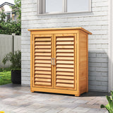Outdoor wooden storage shed with double louvered doors closed, front view