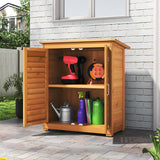 Outdoor wooden storage shed with doors open, interior shelves holding garden tools