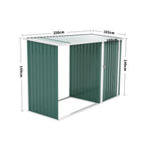 Green metal storage shed with hinged side door, open base, and ribbed panel walls