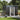 Metal garden storage shed, open sliding doors with lock and interior contents