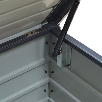 Corner interior view of dark gray storage box with lid strut and metal latch hardware