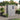 Grey lockable plastic shed with open door and two-pane window, front view