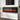 Wall-mounted electric fireplace insert with dark glass panel and bright orange flame LEDs