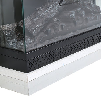 Black electric firebox base with faux logs behind clear glass, in white mantel