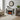 White electric fireplace with mantel, glass doors, and ember flame bed