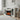 White electric fireplace with glass side doors and central flame window
