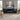 36-inch recessed electric fireplace, black media console with blue flame window