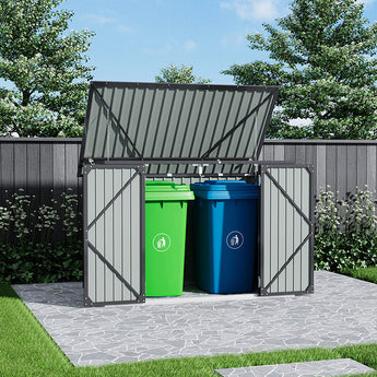 Outdoor metal garbage storage shed with hinged lid open, double doors with two trash bins