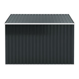 Dark-gray outdoor metal storage shed with sloped roof and vertical ribbed wall panels