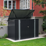 Outdoor bike storage shed with dark-gray metal panels, sloped roof, and lockable double doors