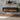 Wall-mounted electric fireplace heater with dark frame and orange flame LED display