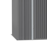 Side wall of metal garden shed with vertical corrugated panels and door edge