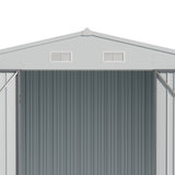 Outdoor tool storage shed roof with two louvered ventilation vents