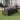 Black steel rectangular raised garden bed planter box with slatted sides, outdoor use
